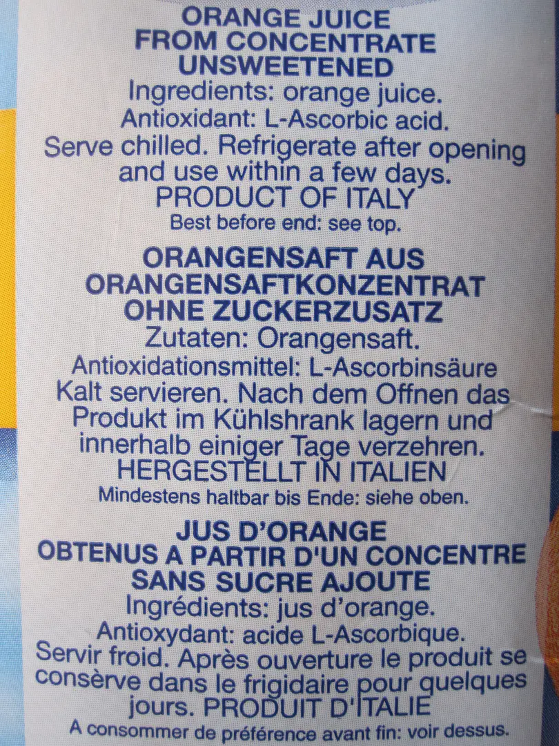 " 13 ITALY Orange juice with ingredients 100% pure italian orange juice made in Italy Tetra Pack descriptions in more languages for export